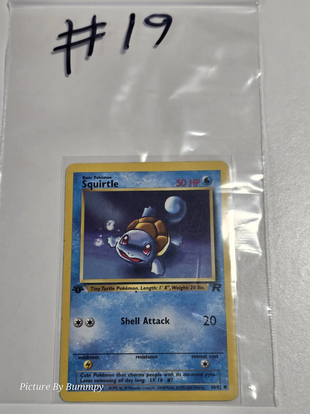 #19 Pokemon 1st Edition Squirtle #68 card from the 1999 Team Rocket set.